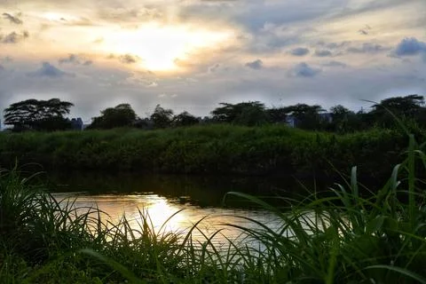 Sunrise view with small river Stock Photos