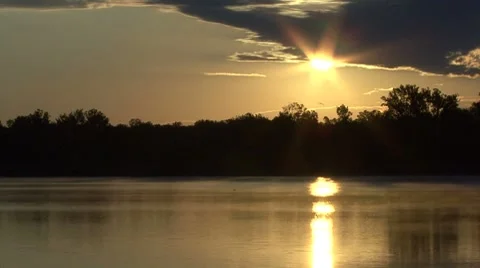 Sunrise on the water timelapse Stock Footage 7765358