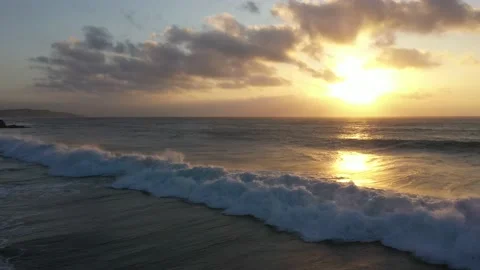 Sunrise wave pullback Stock Footage 139195185