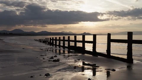 Sunrise Welsh coast looking towards Eryri National Park, North Wales, UK Video stock 334443661