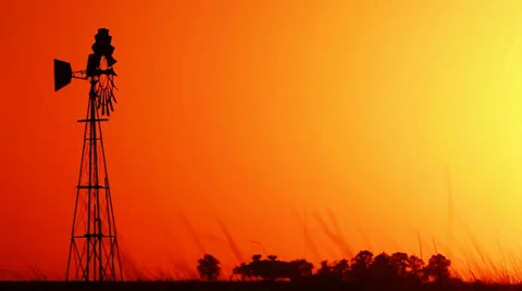 Sunrise with windmill Stock Footage 24447002