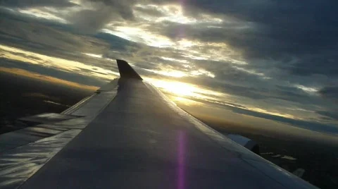 Sunrise from window seat at Bangkok flight Stock Footage