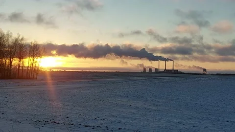 Sunrise in winter. in the background there is smoke from the pipes  Stock Footage 168149337