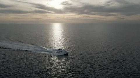 Sunrise the yacht float on the pacific ocean Stock Footage 156525657