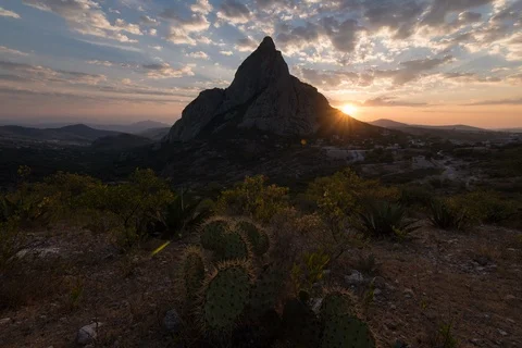 Sunrises behind desert Mountain Stock Footage 116107299