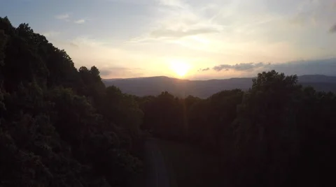 Sunrise/Sunset Over Mountains Stock Footage 51017625