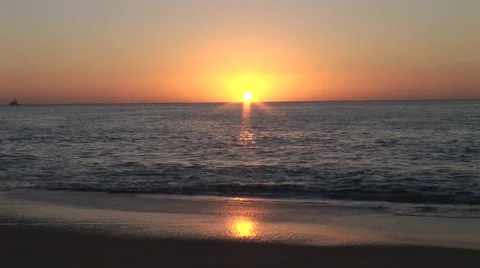 Sunrising Over A Beach In Cabo Stock-Footage 1014656