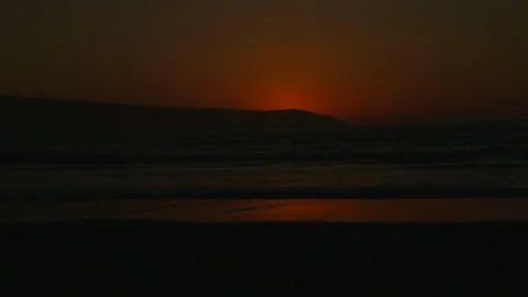 Sunrising over mountain at beach. Stock Footage 88407253