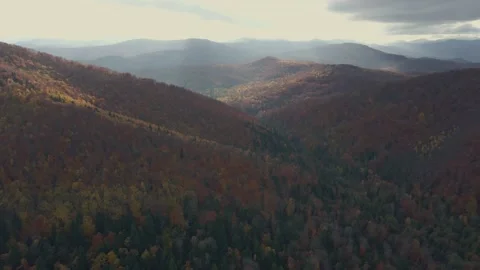 Sun's rays and clouds. Fall in the mountains. Stock Footage 165161567