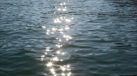 Sun's rays are reflected in the sea water Stock-Footage 27358624