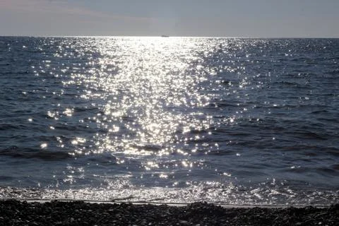 The sun's rays are reflected in the sea Stock Photos