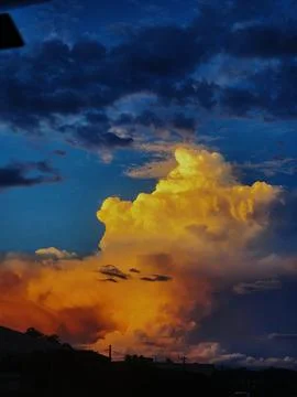 Suns Rays Hit a Cloud Stock Photos