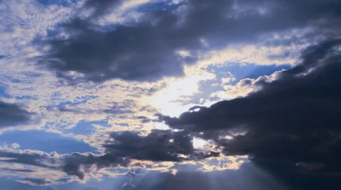 The sun's rays make their way through the thundercloud Stock Footage 28381550