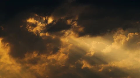 The sun's rays make their way through the clouds. Time lapse Stock Footage 105856354