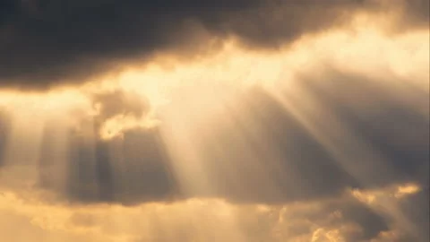 The sun's rays make their way through the clouds. Time lapse Stock Footage 105856961