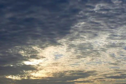 The sun's rays pass through the clouds.Very beautiful sunset. Dramatic sky. T Stock Photos