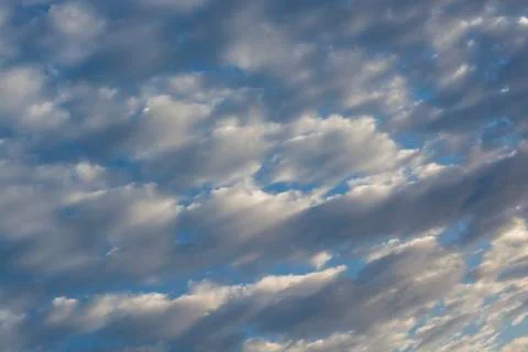 The sun's rays pass through the clouds.Very beautiful sunset. Dramatic sky.Be Stock Photos