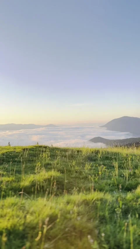 Sun's rays, sunrise in the mountains the river of clouds, above the sky Stock Footage 251622489