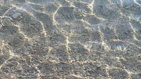 The sun's rays on the surface of the clear sea Stock Footage 97938309