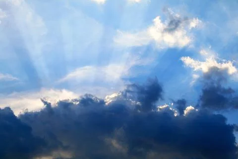 The sun's rays through the clouds Stock Photos