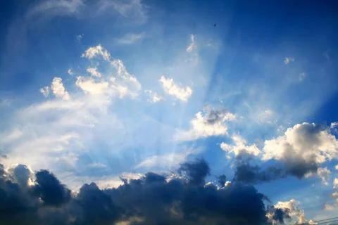 The sun's rays through the clouds Stock Photos