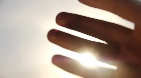 The sun's rays through your fingers Stock Footage