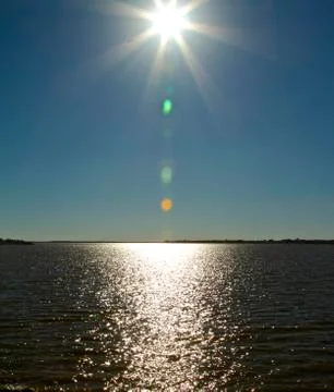 Sun's Reflection on Lake Stock Photos