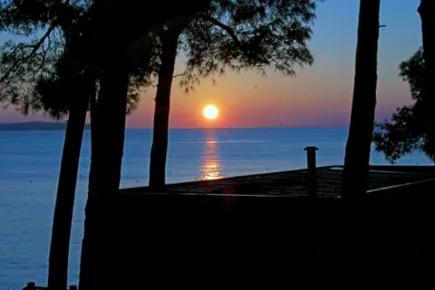 Suns reflection on sea surface Stock Photos