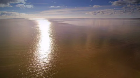 Suns reflection on the water of the sea 스톡 동영상 61076239