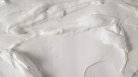 Sunscreen lotion texture smear top view. Video stock 336544153