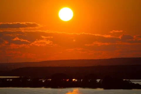Sunse over river Stock Photos