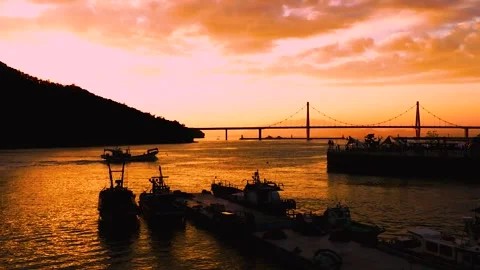 Sunset 1Warm sunset light over tranquil waters and natural scenery Stock Footage 325391951