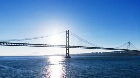 Sunset on the 25 de Abril Bridge in Lisbon Stock Footage 50584059
