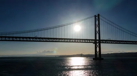 Sunset on the 25 de Abril Bridge in Lisbon Stock Footage 50585664