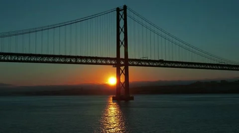 Sunset on the 25 de Abril Bridge in Lisbon Stock Footage 50586070