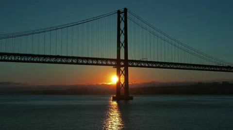 Sunset on the 25 de Abril Bridge in Lisbon Stock Footage 50586256