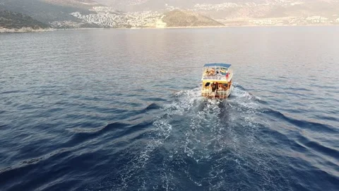 Sunset 3, a Turkish gulet, returning to harbour at sunset Video stock 137105175