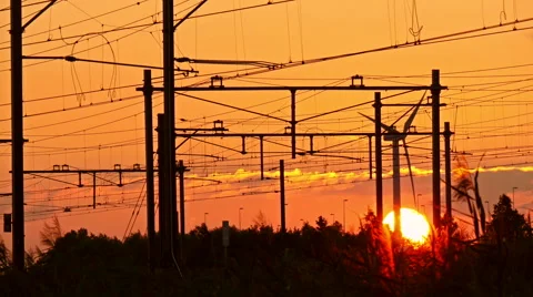 Sunset 4k clip, train is leaving the train station. Stock Footage 66490945