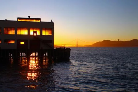 A sunset on the abandoned pier Stock Photos