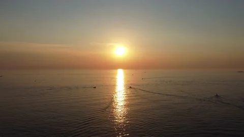 Sunset about a See with Boats Stock Footage 232486154