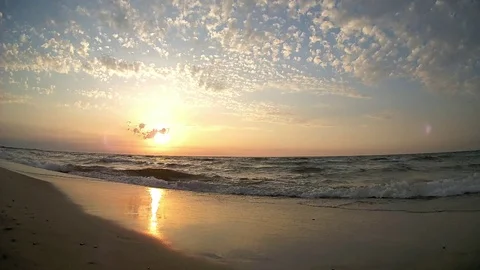 Sunset above beautiful sandy beach Stock Footage 121683122