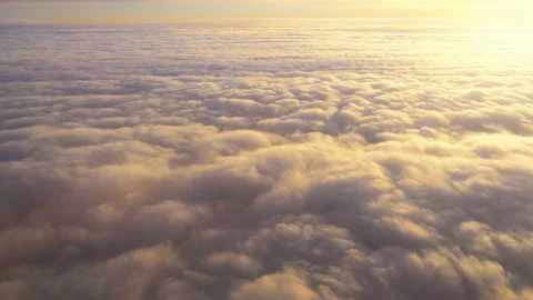 Sunset above the clouds in 4K Stock Footage 88784941