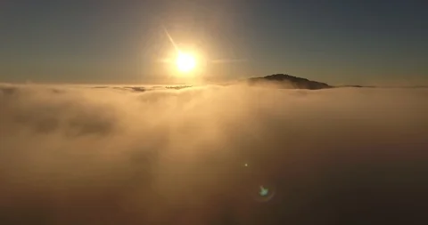 Sunset above the clouds aerial view Stock Footage 98377190