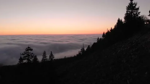 Sunset above the clouds Stock Footage