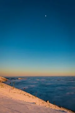 Sunset above the clouds. Winter inversion in Chopok - Low Tatras National Par Stock Photos