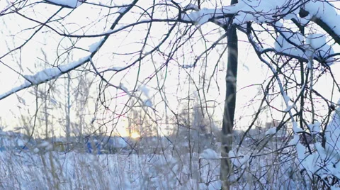 Sunset above field covered by snow Video stock 38017524