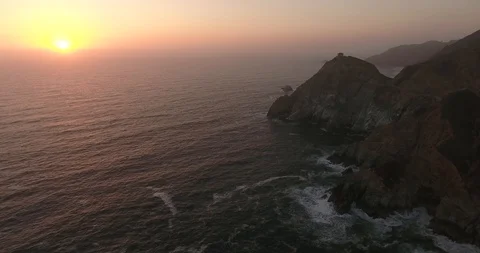 Sunset above high coastal cliffs Stock Footage 98265130