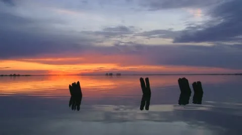 Sunset above a lake Stock Footage 24672881