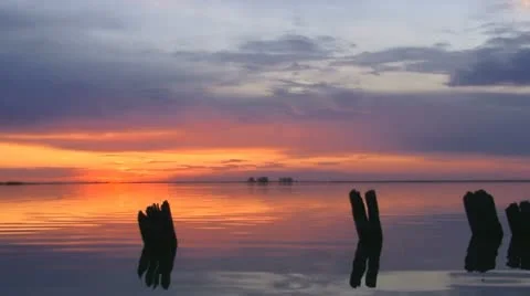 Sunset above a lake Stock Footage 24672886