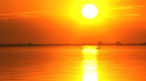 Sunset above a lake Stock Footage 24672957